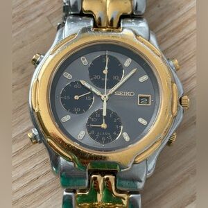 Seiko Men's Chronograph Sports 100 Rare Watch
Two-Tone Bracelet Gray Dial Date